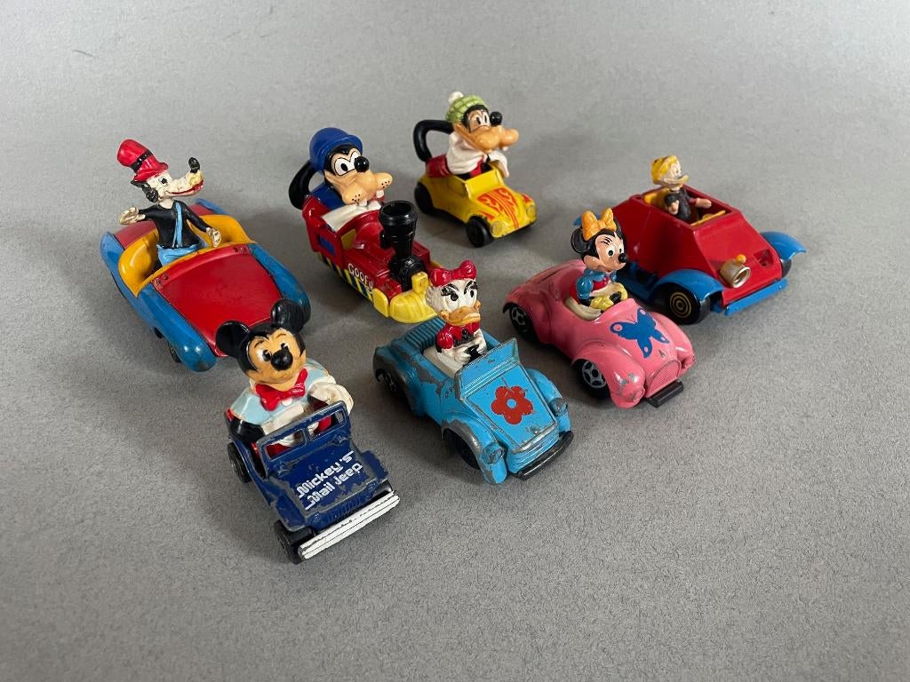 Zeven oude voertuigen met Disney figuren uit de jaren 70/80, Ophalen of Verzenden