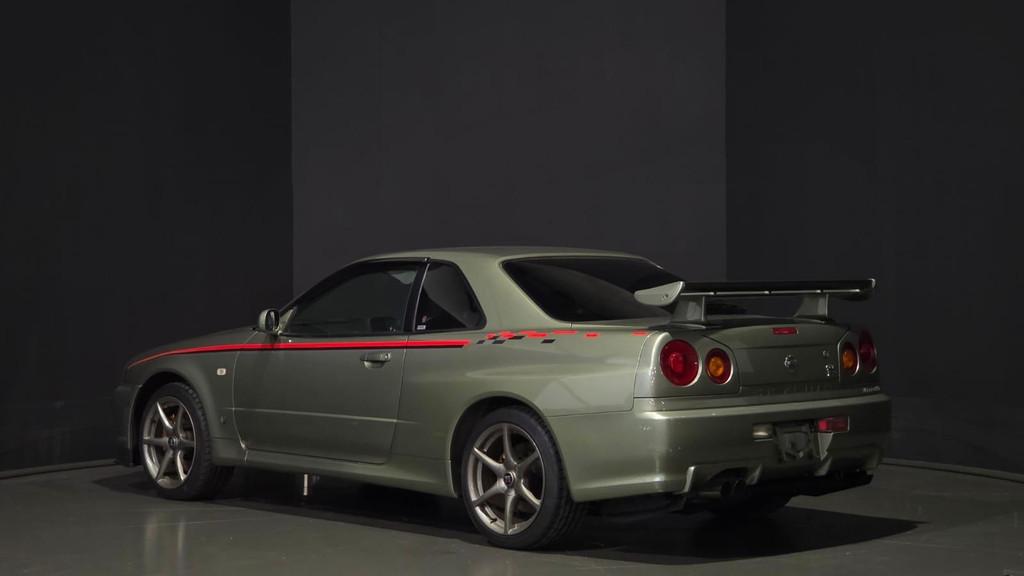 Nissan Skyline R34 GT-R M-Spec Nür Millennium Jade, Auto's, Stof, Gebruikt, Bedrijf, Handgeschakeld