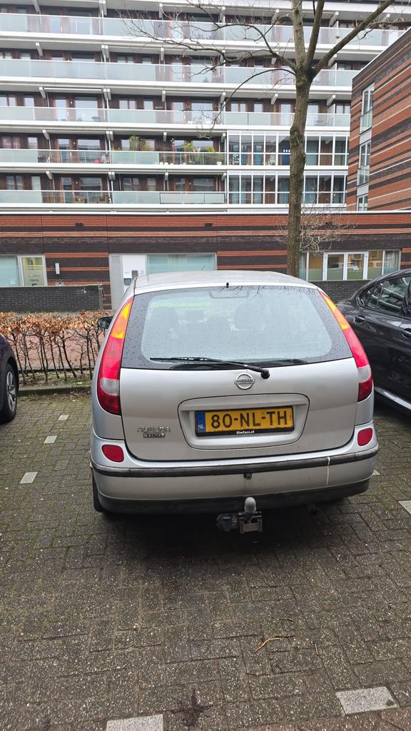 Nissan Almera Tino 1.8 2004 Grijs Apk tot 9-03-2027, Auto's, Nissan, 4 cilinders, Almera Tino, Origineel Nederlands, 115 pk