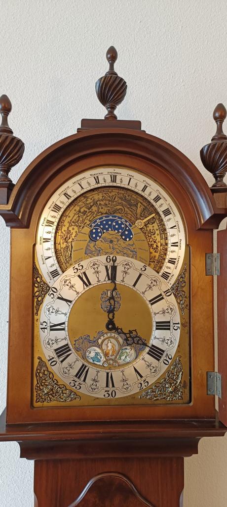 Christiaan Huygens staande klok met planterarium uurwerk, Ophalen