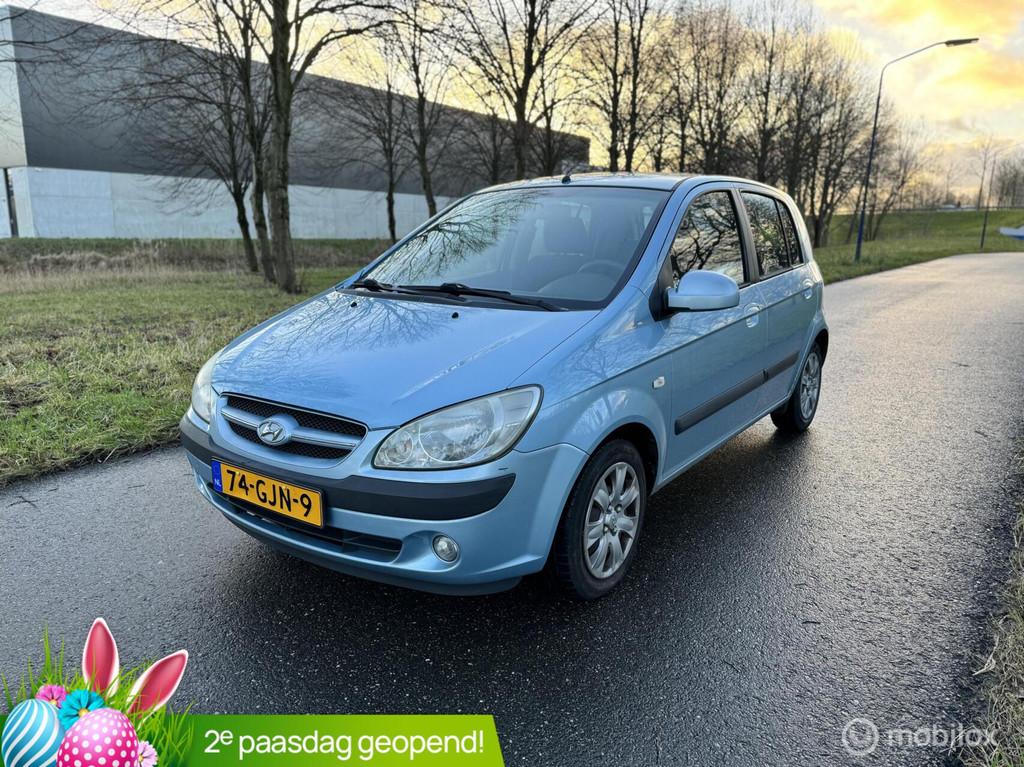 Hyundai Getz 1.4i Active Joy*APK 01/27*PARKEERSENSOR*AIRCO, Zwart, 4 cilinders, Blauw, Origineel Nederlands