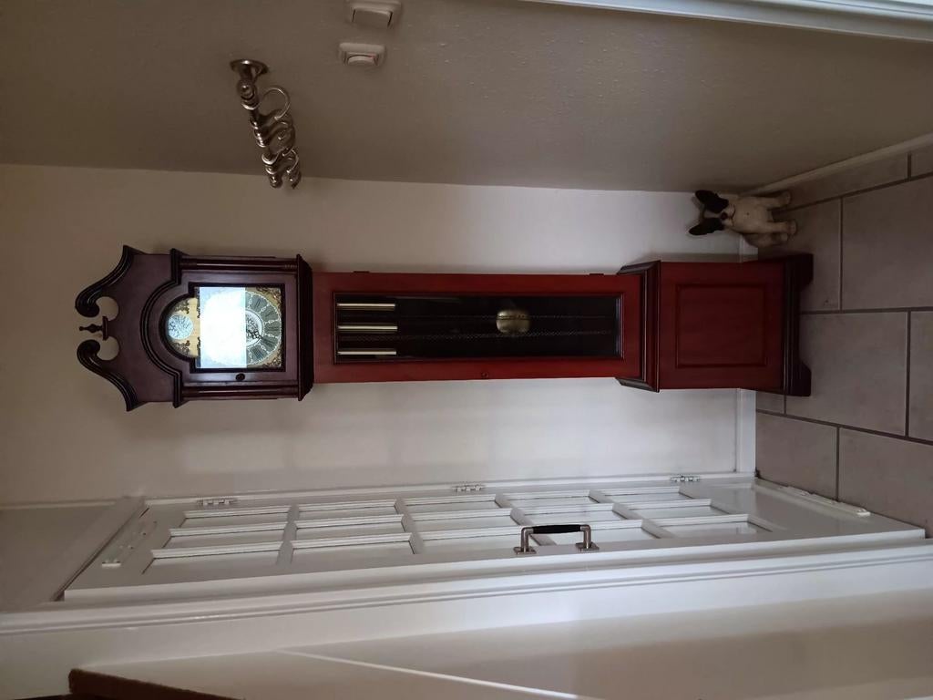 houten  klok westminster, Ophalen