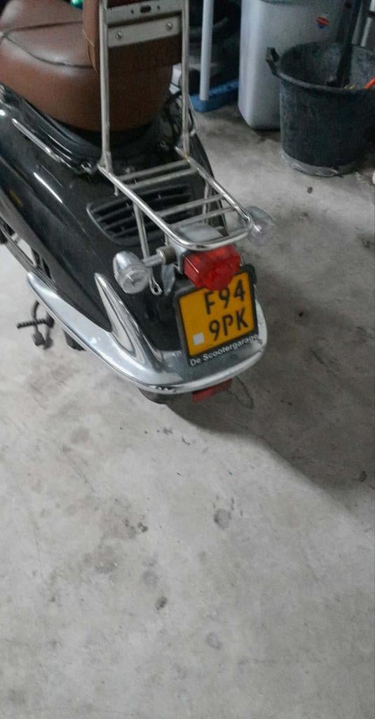 Retro scooter geel kenteken, Ophalen