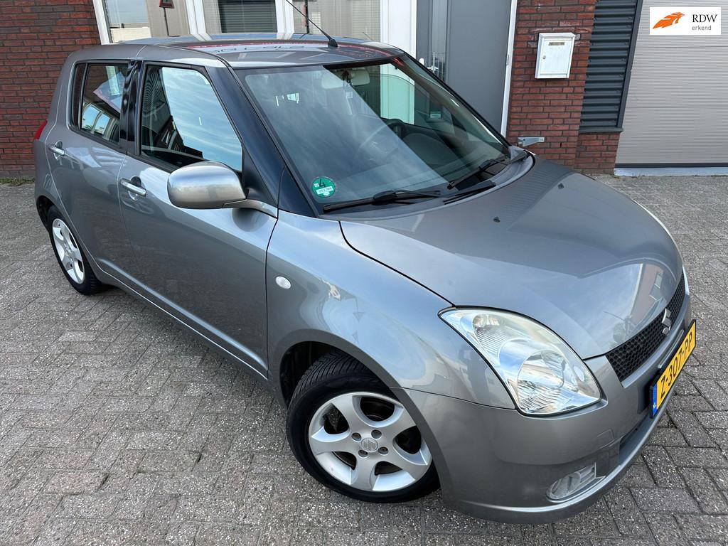 Suzuki SWIFT 1.5 Comfort / Airco / 5DRS / LM / MF Stuur, Auto's, Suzuki, Voorwielaandrijving, Stof, 4 cilinders, Met garantie (alle)