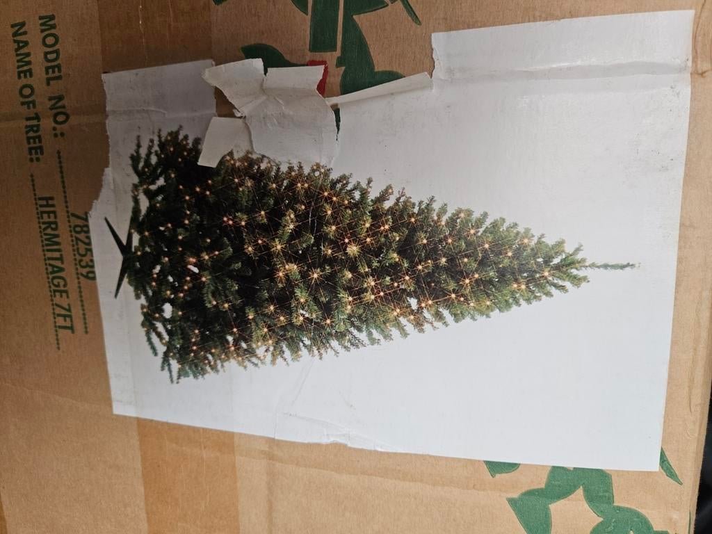 Kunst kerstboom, Ophalen