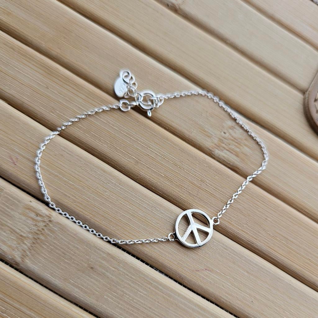 Sterling zilveren peace armband, Nieuw, Ophalen of Verzenden, Met bedels of kralen, Zilver