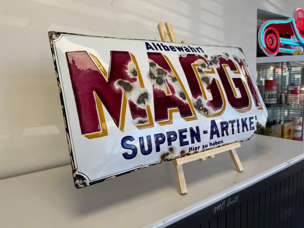 Oud Maggi emaille reclamebord, Ophalen