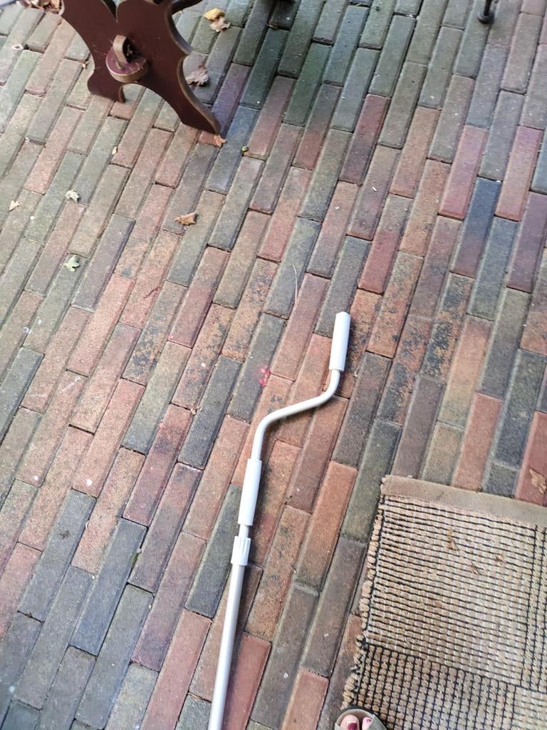 Luifel uitdraai stok, Ophalen