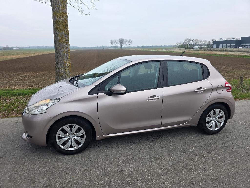 Peugeot 208 1.4 VTI 70KW/95PK 5-D 2012 Grijs, Auto's, Voorwielaandrijving, Stof, 40 €/maand, Origineel Nederlands