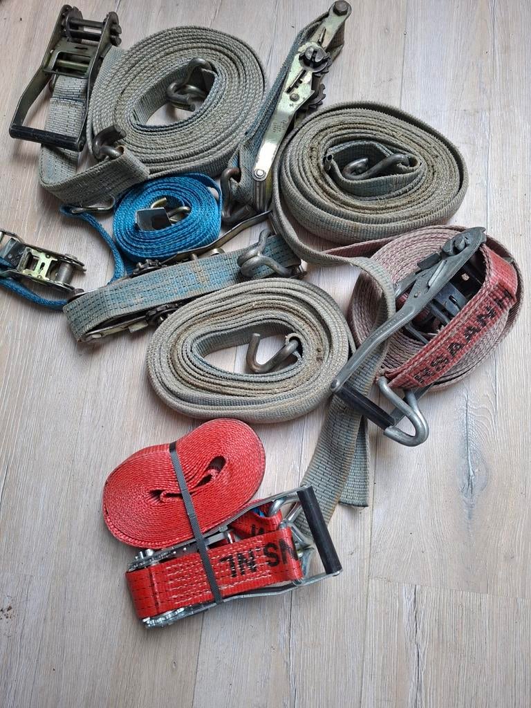 Spanbanden en bagagenet, Ophalen