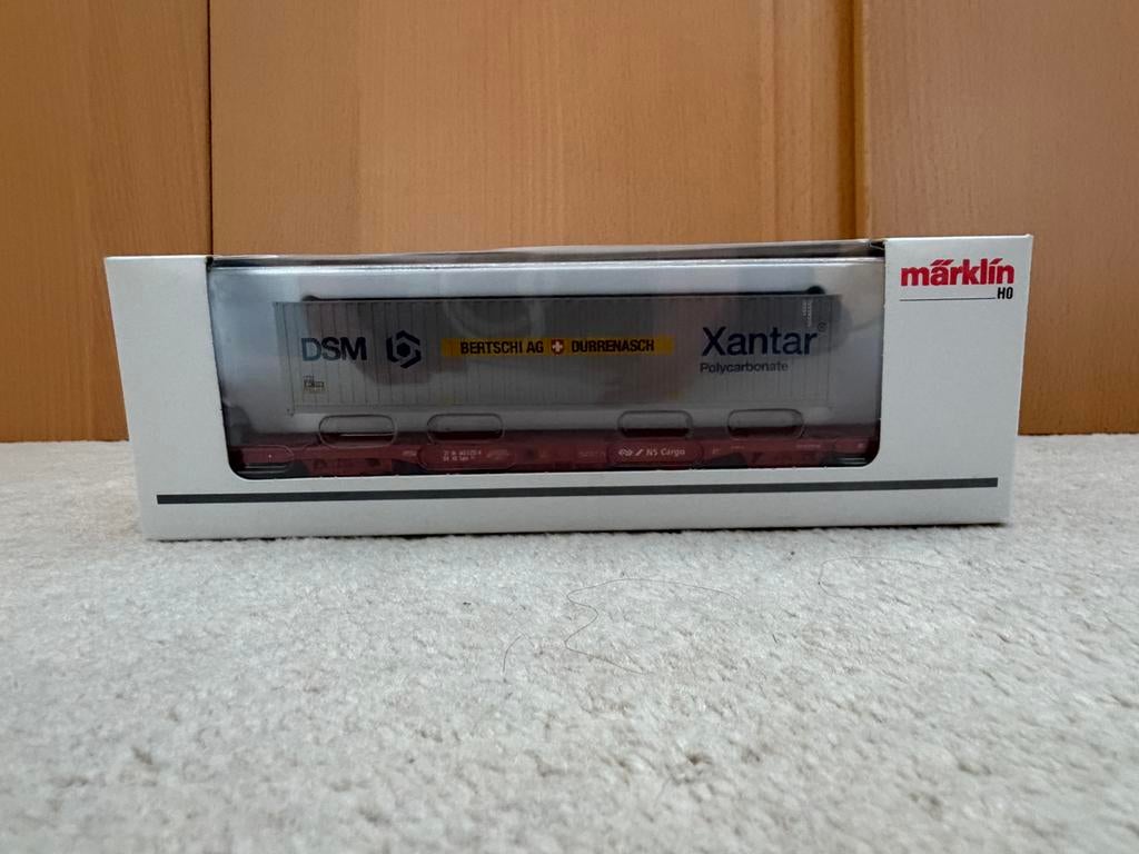 Märklin H0 47701 NS Cargo Wagon met DSM Xantar Container, Hobby en Vrije tijd, Modeltreinen | H0, Nieuw, Wagon, Gelijkstroom of Wisselstroom