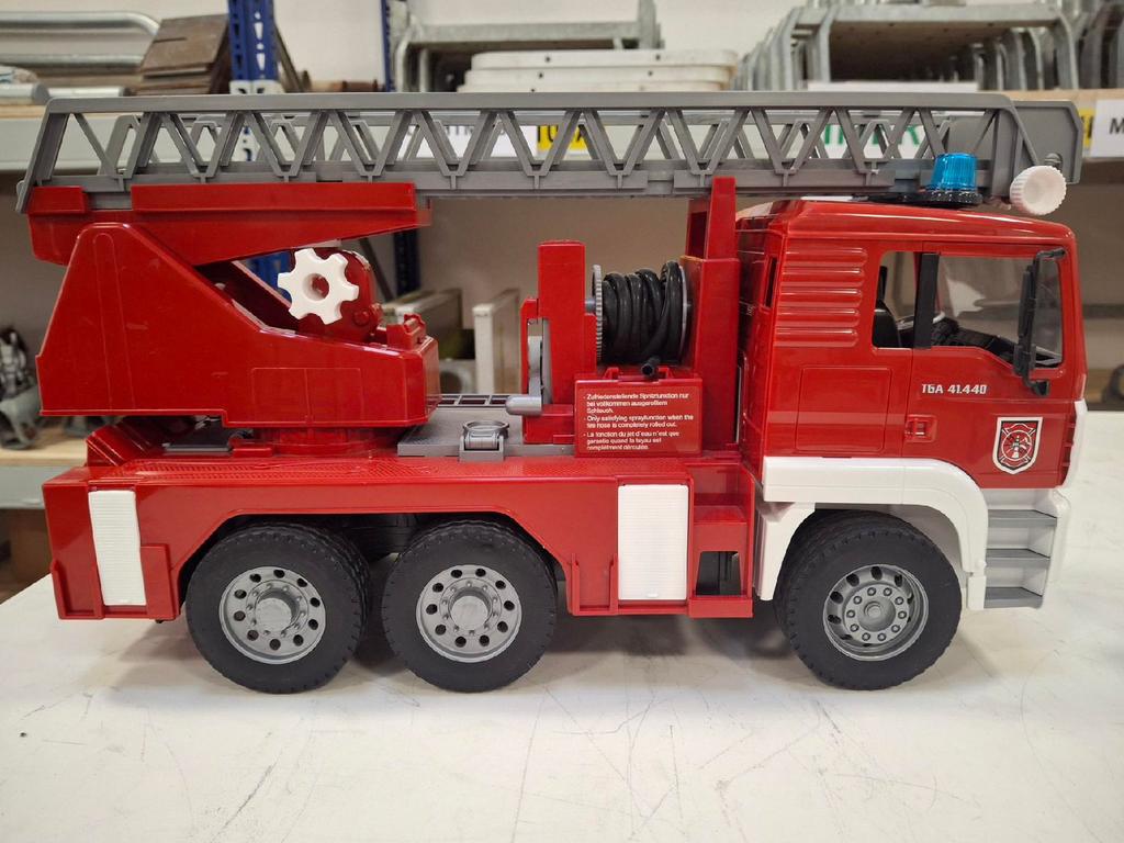 Bruder MAN TGA in brandweer uitvoering, Ophalen of Verzenden, Zo goed als nieuw
