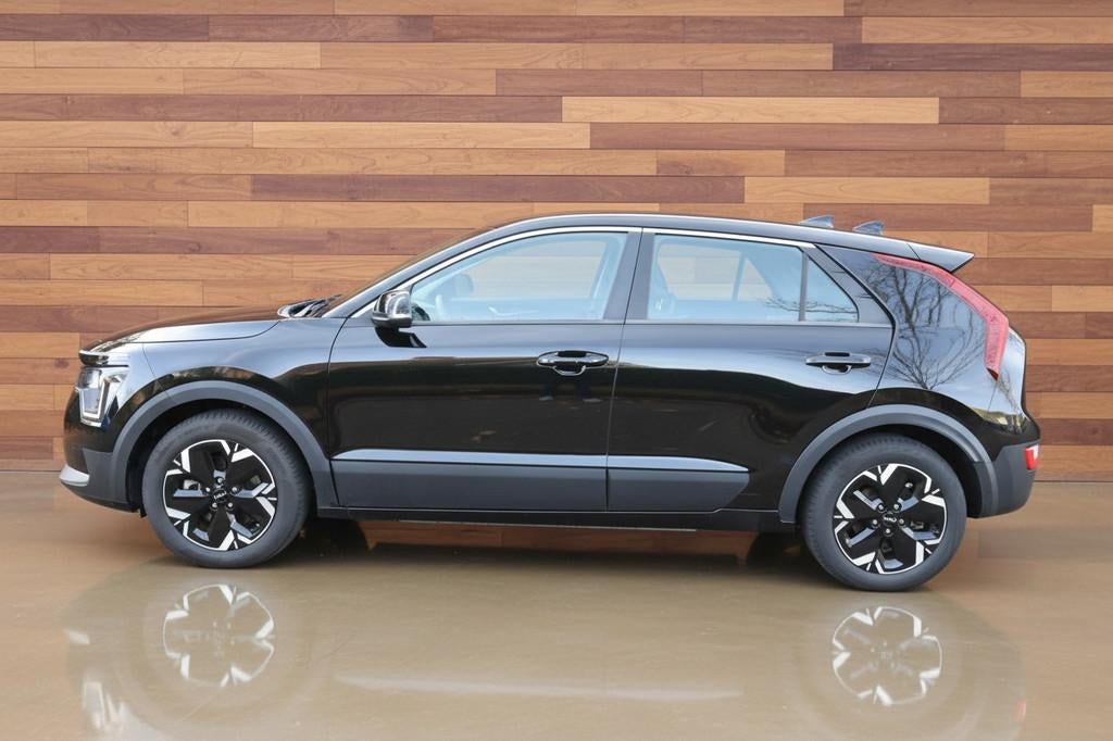 Kia Niro EV ComfortLine 64.8 kWh | NIEUW MODEL | SOH 100% |, Stof, Gebruikt, Met garantie (alle), 1657 kg