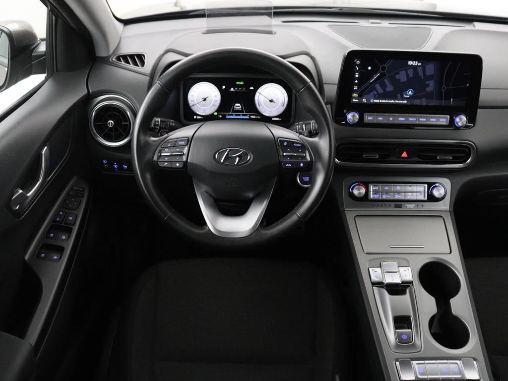 Hyundai Kona EV Fashion 64 kWh | SOH 100% | 3 Fase | Head-Up, Stof, Gebruikt, Bruin, Origineel Nederlands