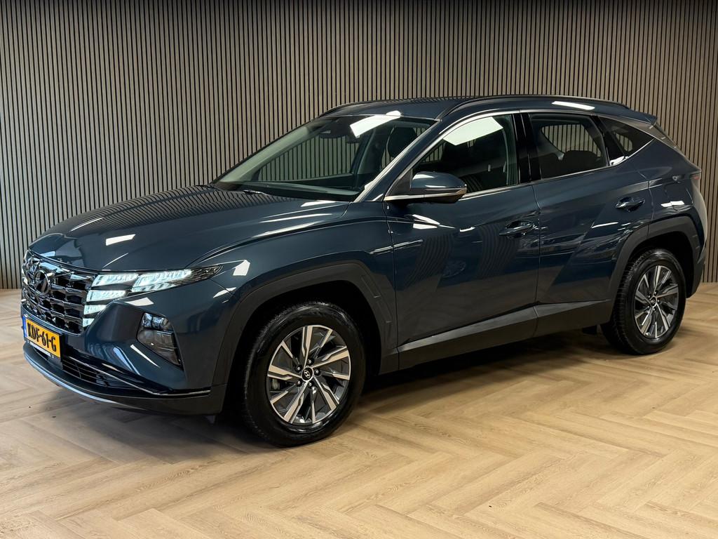 Hyundai Tucson 1.6 T-GDI HEV Comfort AUT. TREKHAAK CAMERA NA, Auto's, Hyundai, Stof, Gebruikt, Euro 6, 4 cilinders