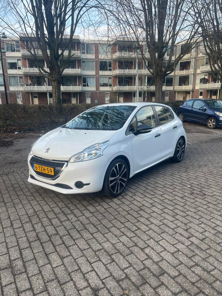 Peugeot 208 1.0 VTI 50KW/68PK 5-D 2014 Wit, Auto's, Peugeot, Voorwielaandrijving, Origineel Nederlands, 3 cilinders, 999 cc