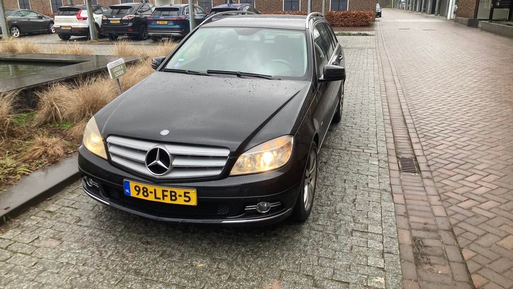 Mercedes-Benz C-Klasse 1.8 C180 CGI Estate AUT 2010 Zwart, Auto's, Achterwielaandrijving, 1800 kg, Zwart, Zwart
