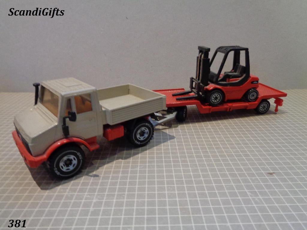 siku unimog met aanhanger met heftruck, Hobby en Vrije tijd, Ophalen of Verzenden, Zo goed als nieuw, Bus of Vrachtwagen