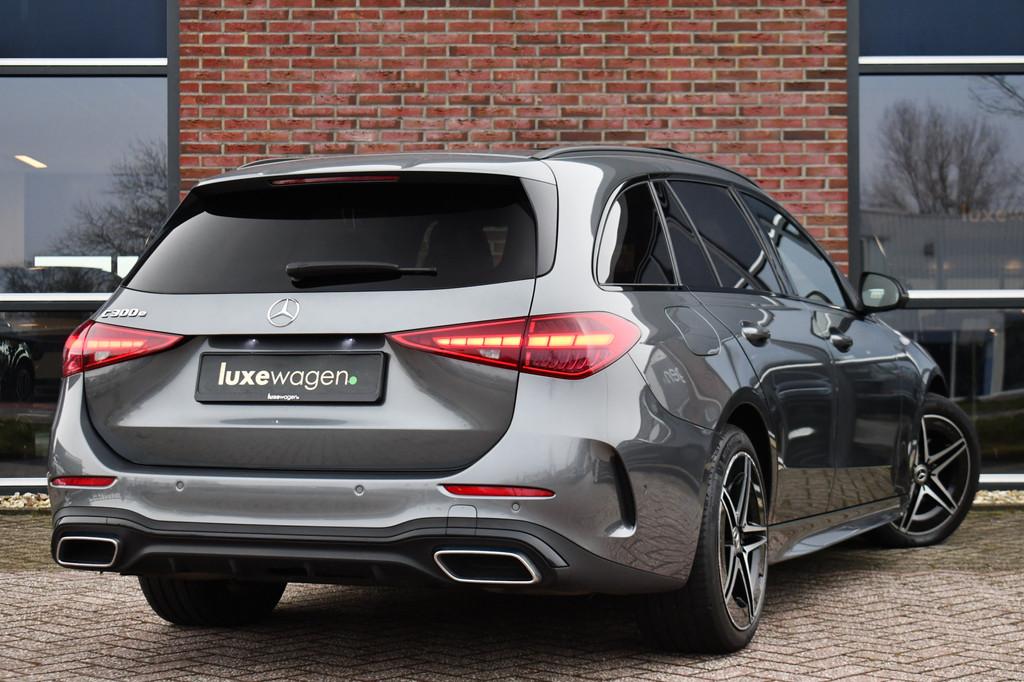 Mercedes-Benz C-Klasse Estate 300 e AMG Line Pano Trekh Dist, Auto's, Automaat, 12 maanden, Achterwielaandrijving, Zwart