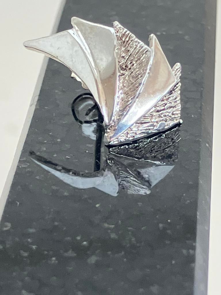 Solo oorsteker Fins design AKT, Ophalen of Verzenden, Zo goed als nieuw, Zilver, Overige materialen