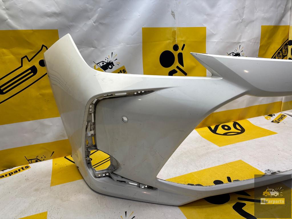 Toyota Corolla E21 voorbumper PDC 53112-02D00, Info@fabrikant.eu, Ophalen of Verzenden, Toyota, Bumper