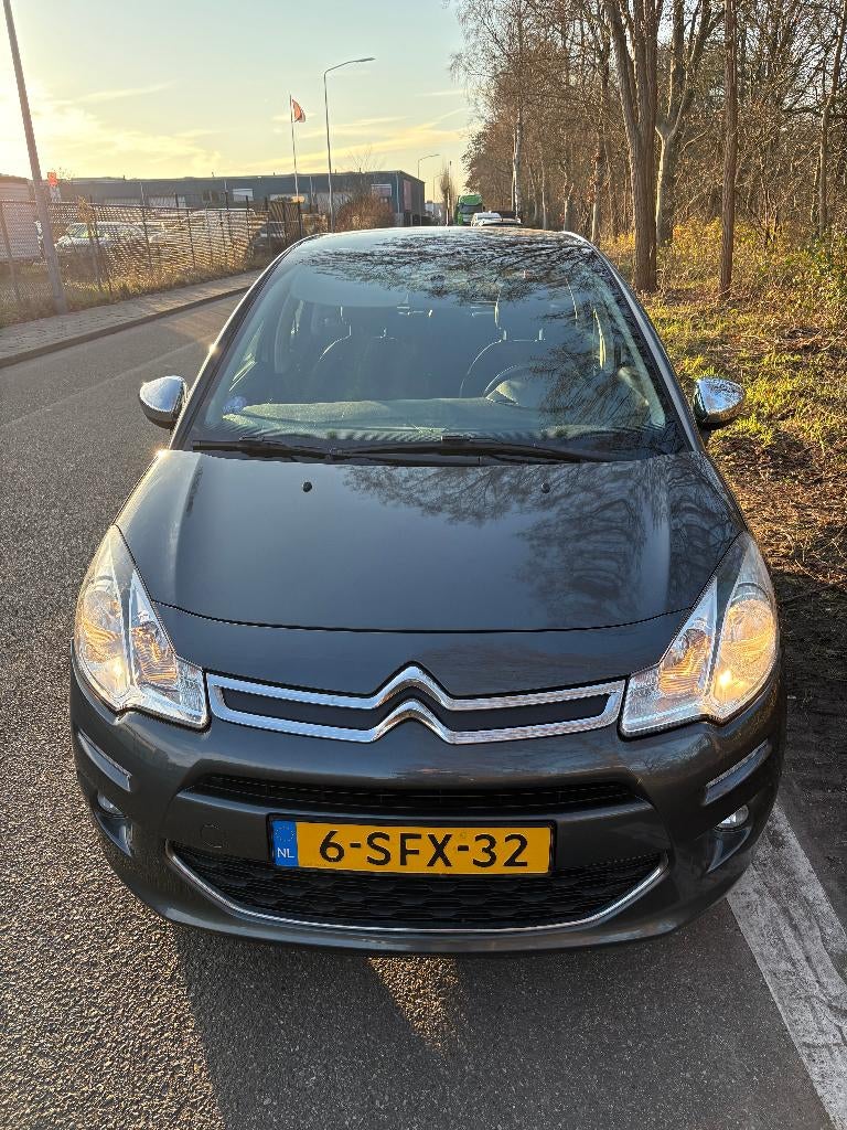Citroën C3 1.2 VTI 60KW/82PK 2013 Grijs model 2014, Auto's, Citroën, Voorwielaandrijving, 31 €/maand, 1199 cc, Leder en Stof