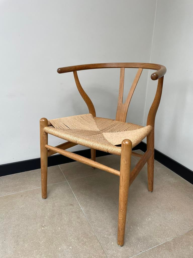 Set van 4 Carl Hansen Wishbone chairs, Huis en Inrichting, Ophalen of Verzenden, Zo goed als nieuw, Bruin, Hout