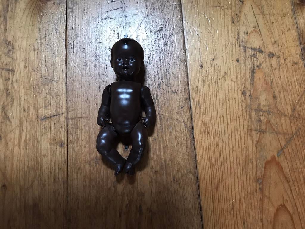 Donker  oud schildpad popje, Ophalen of Verzenden, Zo goed als nieuw, Pop