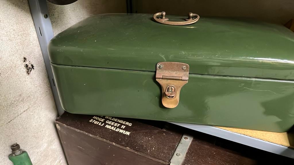 Emaille  groen koektrommel, Ophalen