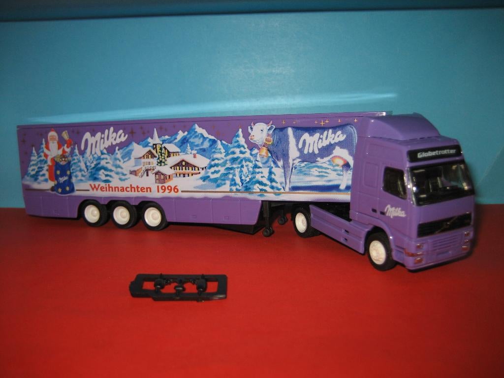 Milka  Kerst 1996  VOLVO  FH12  met oplegger  Herpa/Albedo, Ophalen of Verzenden, Nieuw, Bus of Vrachtwagen, Herpa