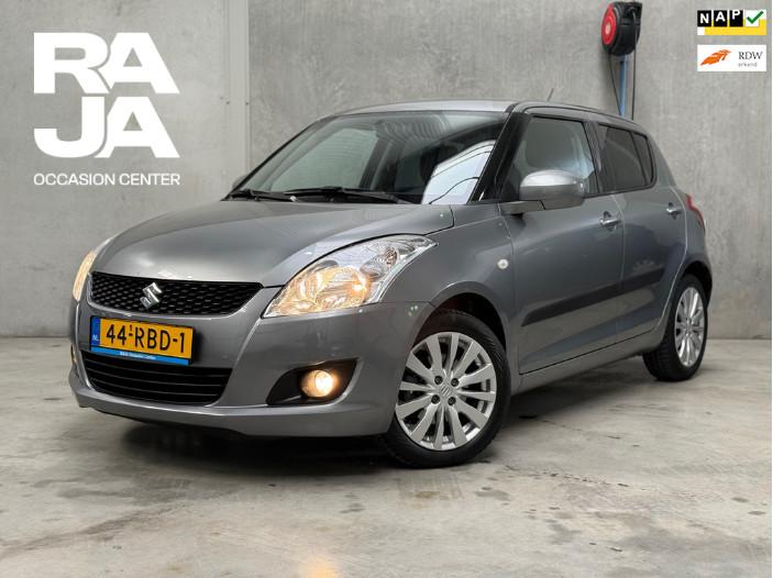 Suzuki Swift 1.2 Exclusive EASSS NAP NEW APK Keyless Clima, Auto's, Voorwielaandrijving, Stof, Gebruikt, 4 cilinders