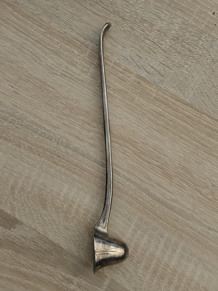 Antieke zilveren kaarsendover, Ophalen