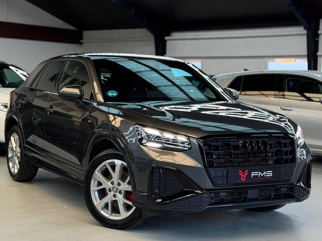 Audi Q2 35 TFSI 3x S-Line CarPlay Camera, 4 cilinders, Leder en Stof, Bedrijf, 690 kg
