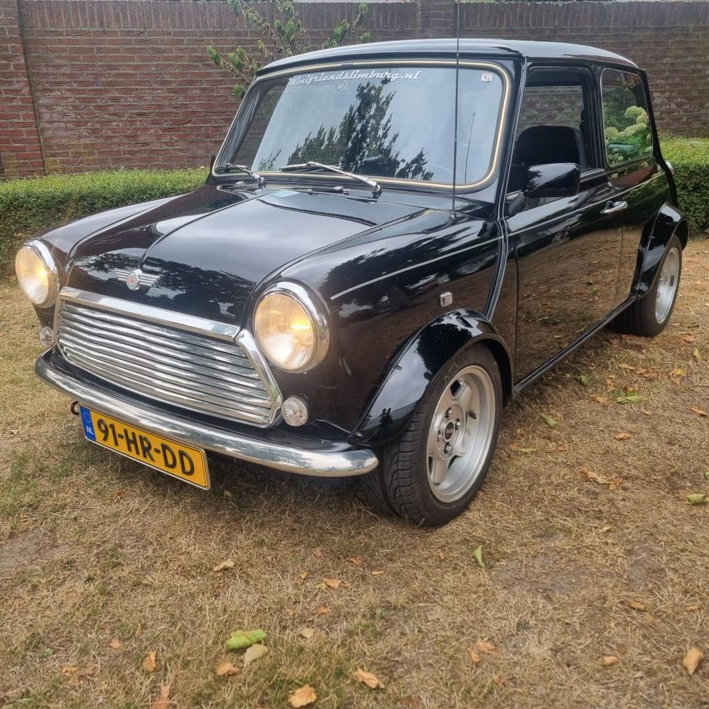 Rover Mini 1.3 I Cooper 1994 Zwart, Auto's, Rover, Voorwielaandrijving, Overige modellen, 4 cilinders, Leder en Stof