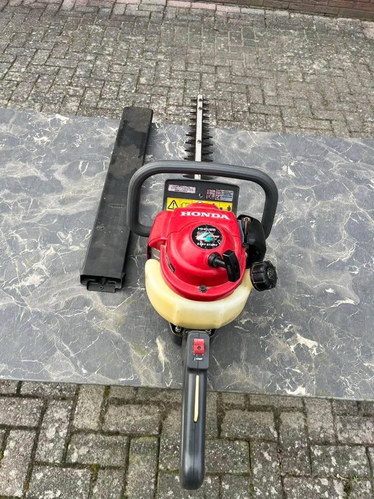 Nette Honda 4 takt heggenschaar, Tuin en Terras, Ophalen, Gebruikt, Benzine