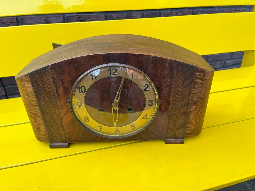 Pendule Klok, Ophalen