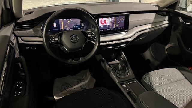 Skoda Octavia Combi 1.0 TSI Business Edition |Camera|2x PDC|, Auto's, Stof, Gebruikt, Met garantie (alle), Wit