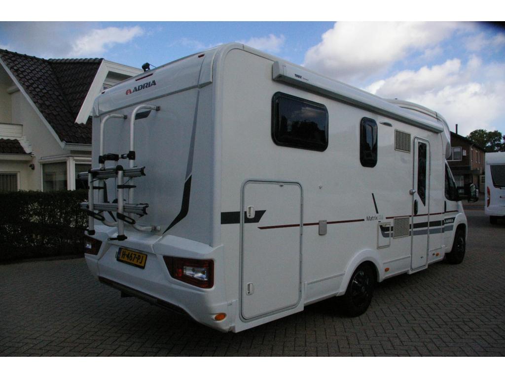 Adria Matrix M 670 SL Enkele bedden, Hefbed, XXL Garage., Caravans en Kamperen, Ringverwarming, Airbags, Adria, L-zit