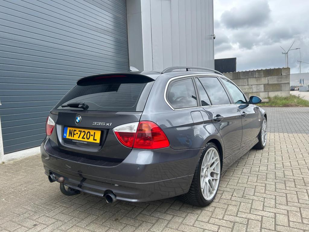 BMW 3-serie Touring 335xi High EXE AUT NAVI XENON PDC, Auto's, Automaat, Zwart, Leder en Stof, 10 km/l