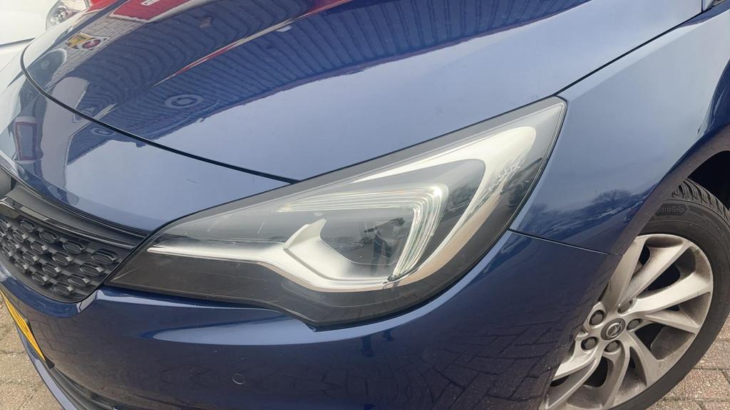 Opel Astra Sports Tourer 1.2 Elegance 131PK / TREKHAAK / BOS, Auto's, Voorwielaandrijving, Lichtsensor, 1199 cc, Blauw