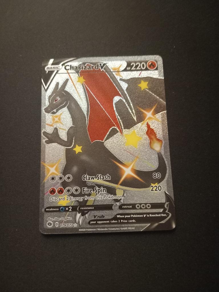 Charizard V Shiny pokemonkaart, Ophalen of Verzenden, Zo goed als nieuw
