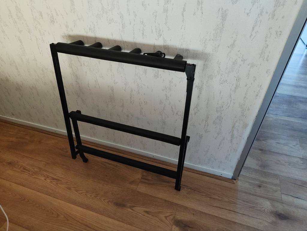 Gitaarstandaard, Ophalen