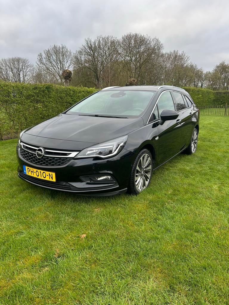 Opel Astra 1.4 Turbo 2017 Zwart, Auto's, Voorwielaandrijving, Stof, 4 cilinders, Zwart