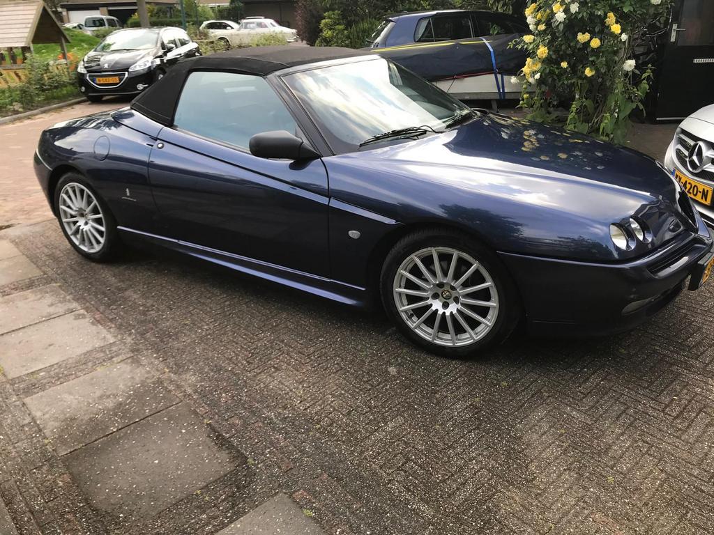 Alfa Romeo Spider 2.0 Twin Spark 16V 2002 Blauw, Auto's, Alfa Romeo, Voorwielaandrijving, 1345 kg, Zwart, Cabriolet