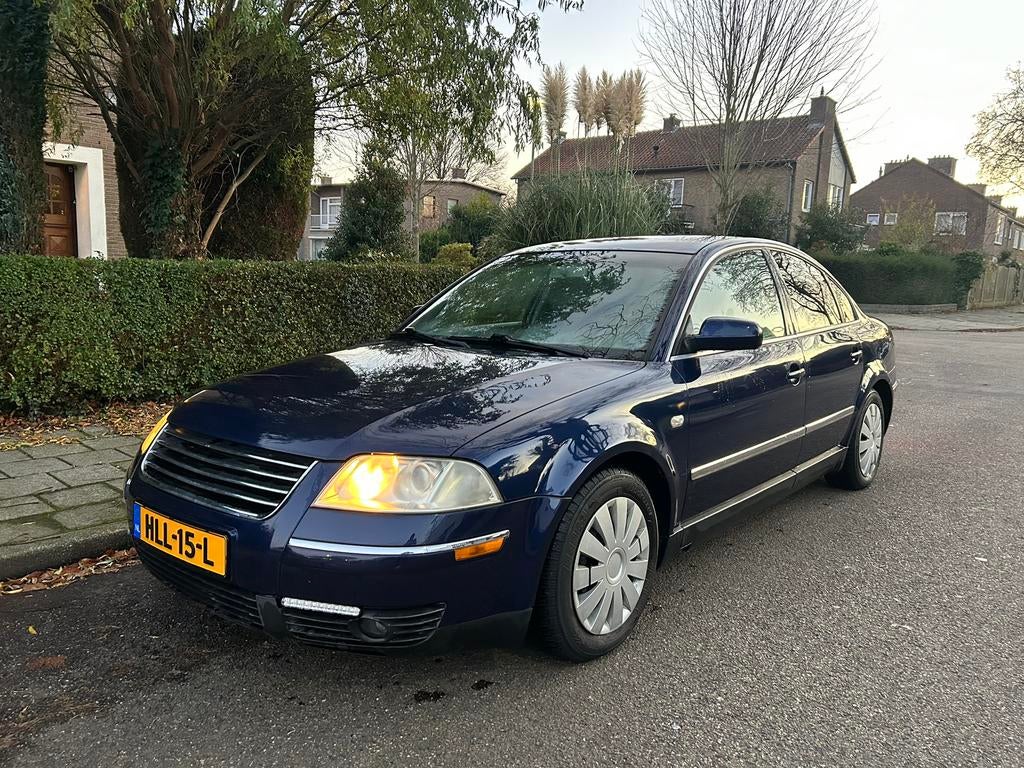 Volkswagen Passat 1.6 Trendline - Stoelverwarming - LPG, Auto's, Voorwielaandrijving, Stof, Zwart, 4 cilinders