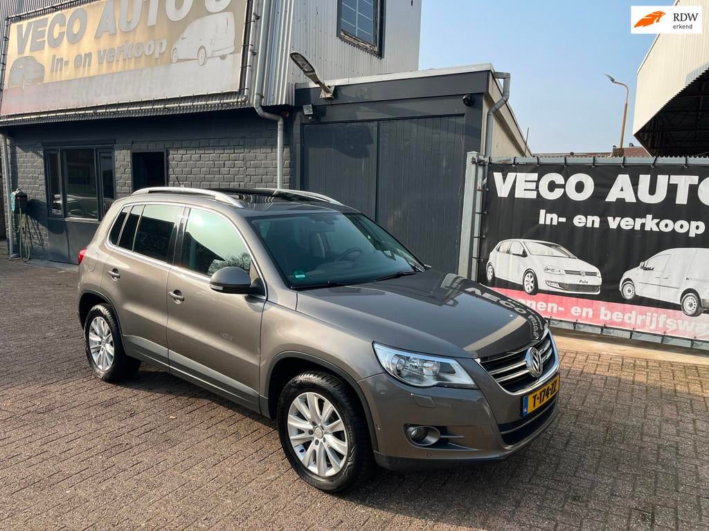 Volkswagen Tiguan 2.0 TSI Sport&Style 4Motion panorama navi, Automaat, Stof, Gebruikt, Zwart