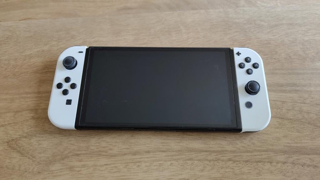 Zo goed als nieuwe Nintendo Switch OLED, Ophalen of Verzenden, Zo goed als nieuw, Met 2 controllers, Switch OLED