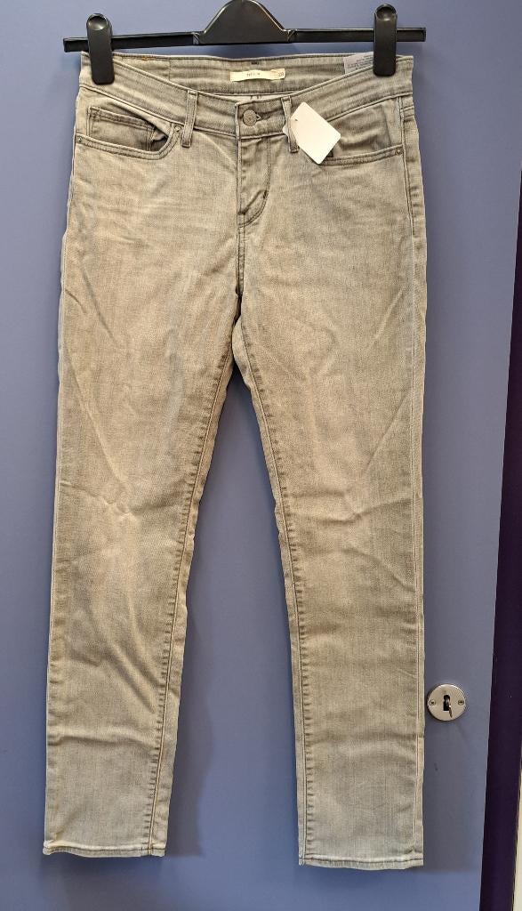 Levi Levi's 712 slim licht grijze jeans mt 28 / S nr 46978, Kleding | Dames, Broeken en Pantalons, Zo goed als nieuw, Maat 36 (S)