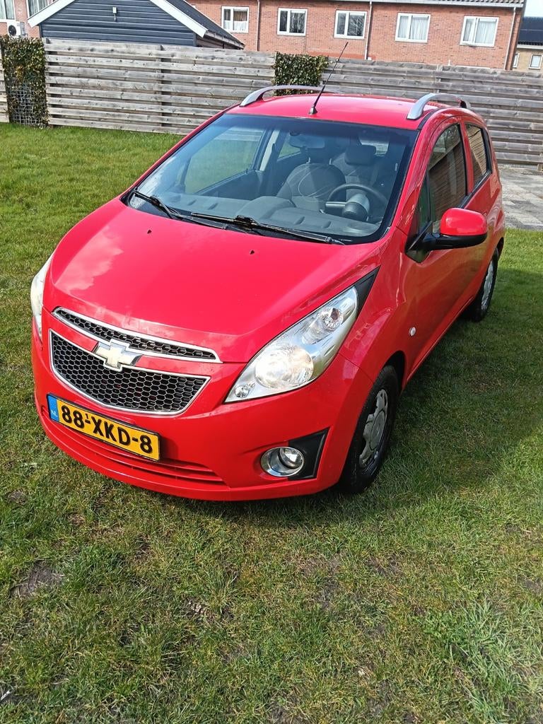 Chevrolet Spark 1.0 Bifuel 2012 Rood, Auto's, Euro 5, 37 €/maand, Zwart, 4 cilinders