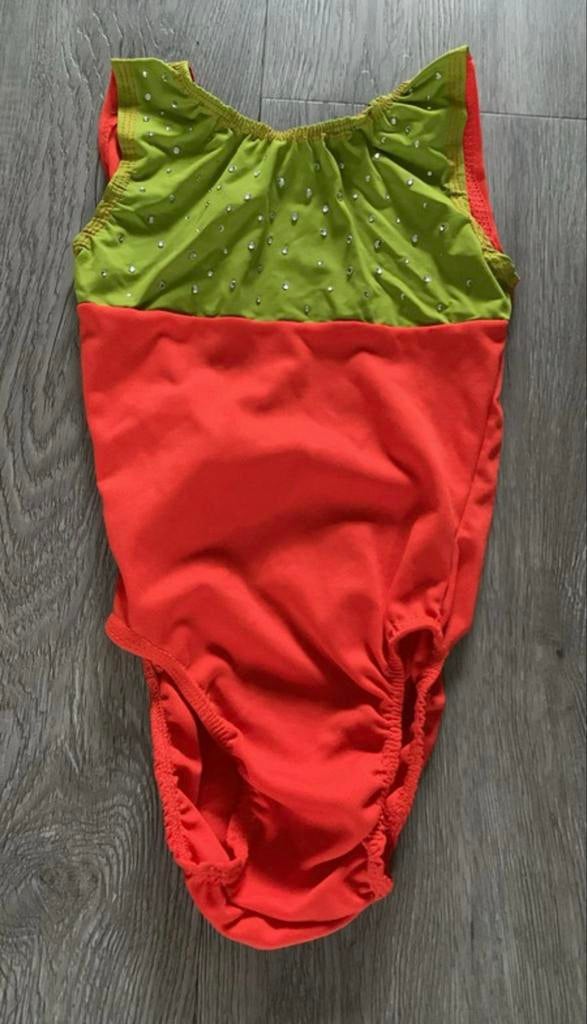 Turnpakje Maat 104, Oranje, Ophalen of Verzenden, Zo goed als nieuw, Kleiner dan kindermaat 122